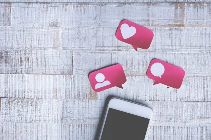 Smart Phone With Paper Cut Social Media Icons In Speech Bubble