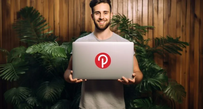 Male Confidently Holding Pinterest Logo